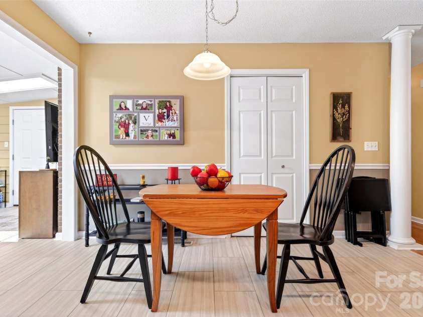 54 Deer Run Drive, Marion, NC 28752.  MLS# CAR4366901, YatesRealty ID 16636. The breakfast area with doors to kitchen pantry