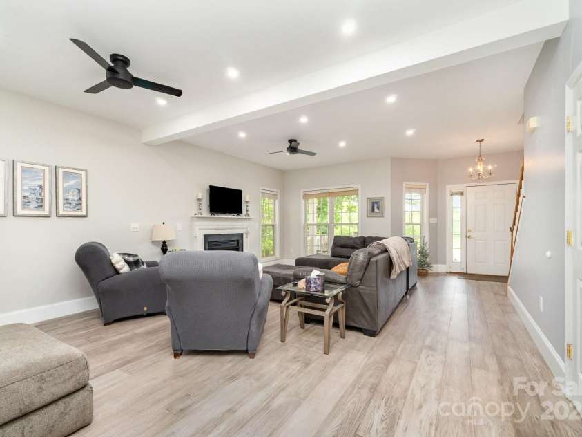 7525 Windy Pine Circle, Denver, NC 28037.  MLS# CAR4250896, YatesRealty ID 16636. Wide open and bright living area.