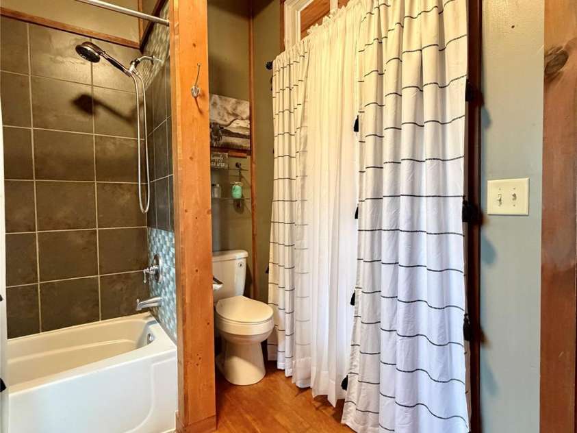 1142 Clearwater Parkway, Rutherfordton, NC 28139.  MLS# CAR4366503, YatesRealty ID 16637. Upper level primary bathroom view 3