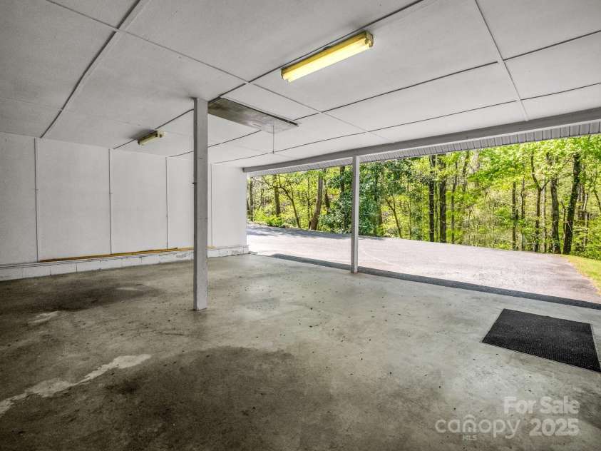 128 Washburn Road, Lake Lure, NC 28746.  MLS# CAR4247181, YatesRealty ID 16641. 