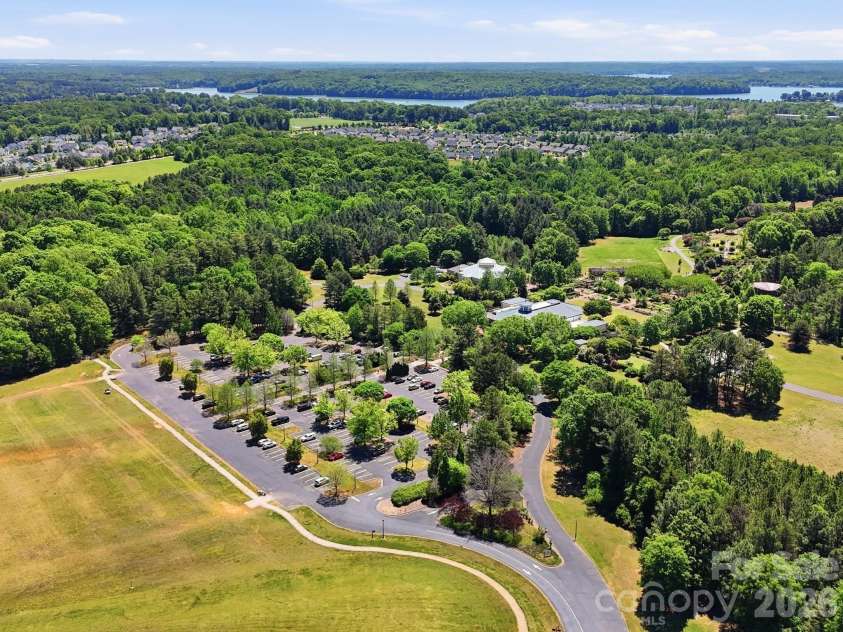 431 Trillium Way, Belmont, NC 28012.  MLS# CAR4372029, YatesRealty ID 16641. Daniel Stowe Conservancy adjacent to The Conservancy at McLean and connected via sidewalks