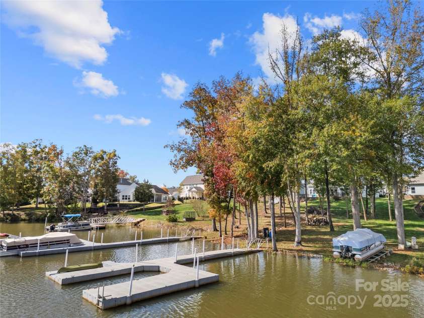 25566 Seagull Drive, Lancaster, SC 29720.  MLS# CAR4266015, YatesRealty ID 16645. 10' wide slip in floating dock and a boat slide 