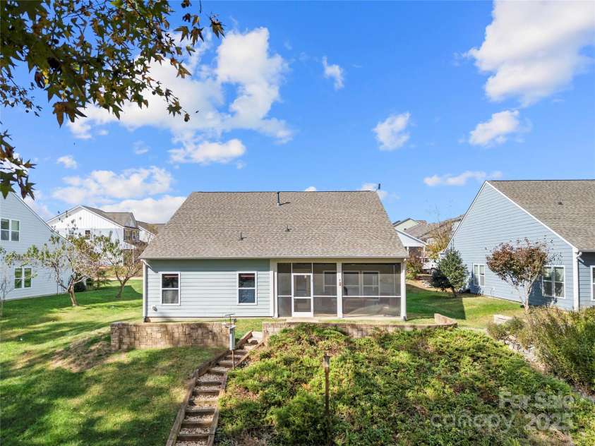 25566 Seagull Drive, Lancaster, SC 29720.  MLS# CAR4266015, YatesRealty ID 16645. Freshly painted exterior and screened in porch