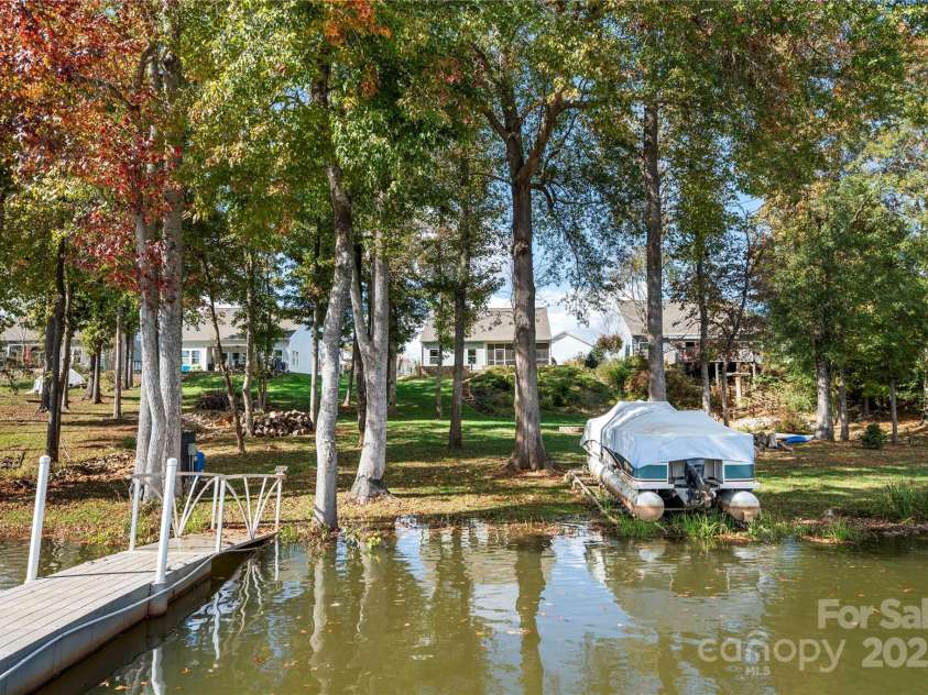 25566 Seagull Drive, Lancaster, SC 29720.  MLS# CAR4266015, YatesRealty ID 16645. Pontoon slide on the shore for easy storage