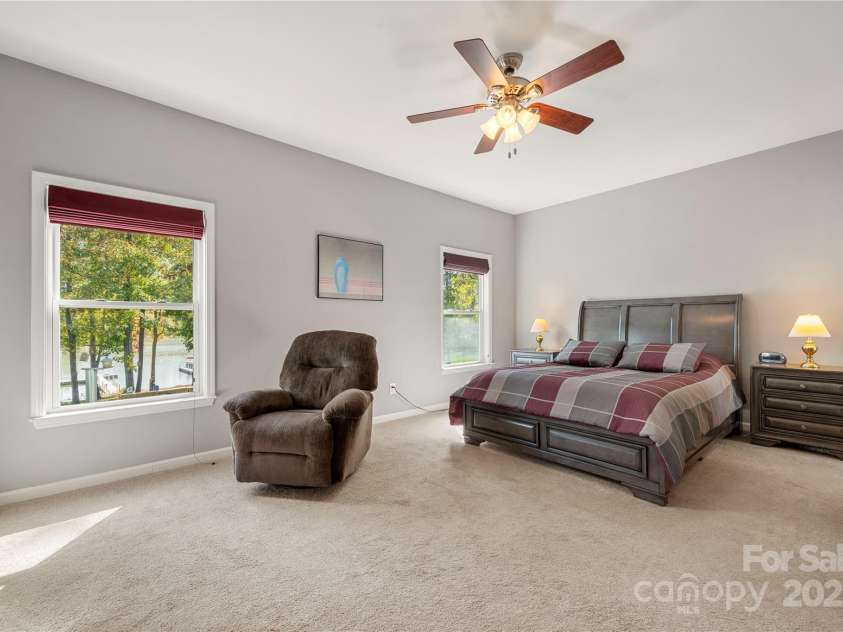 25566 Seagull Drive, Lancaster, SC 29720.  MLS# CAR4266015, YatesRealty ID 16645. Primary bedroom with Lake views 