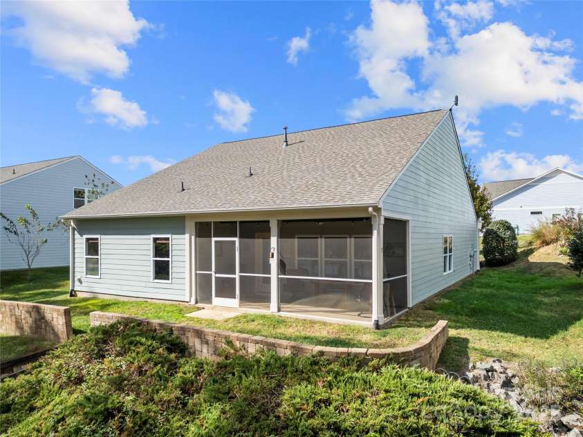 25566 Seagull Drive, Lancaster, SC 29720.  MLS# CAR4266015, YatesRealty ID 16645. Spacious, screened in rear porch with additional yard space 