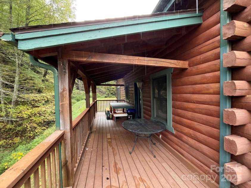 8020 Meadow Fork Road, Hot Springs, NC 28743.  MLS# CAR4306581, YatesRealty ID 16652. Main lodge covered deck