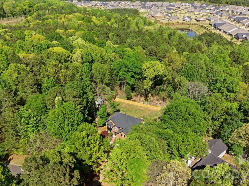 3919 Cherrybrook Drive, Mint Hill, NC 28227.  MLS# CAR4361904, YatesRealty ID 16653. Look at all that privacy!!
