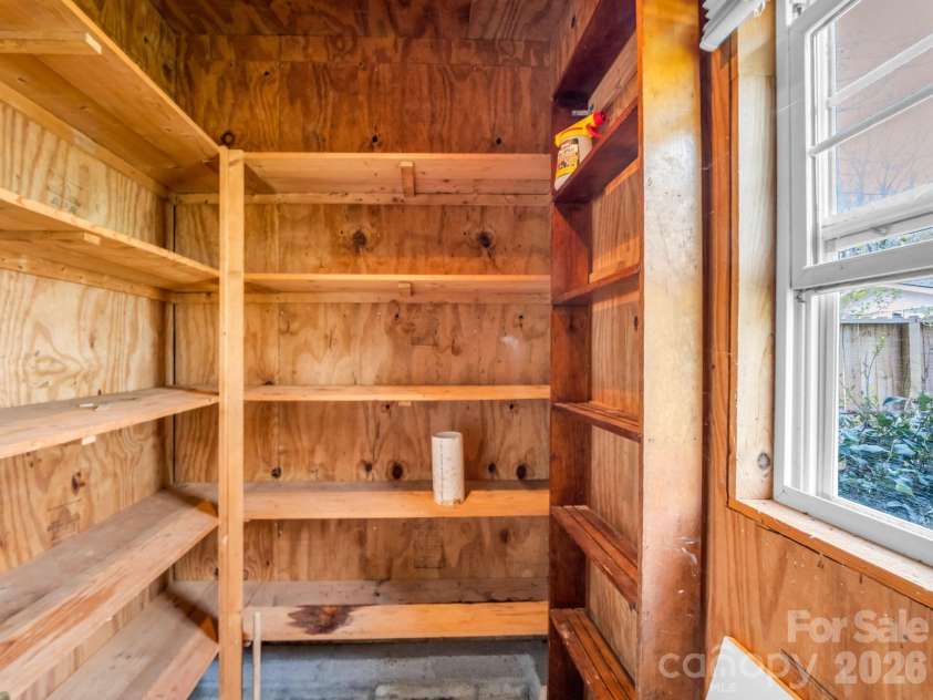 212 Vance Avenue, Black Mountain, NC 28711.  MLS# CAR4367004, YatesRealty ID 16655. Built-in shelving for storage and organization.
