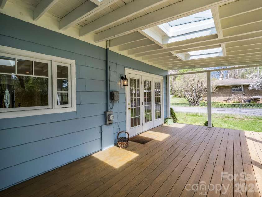 212 Vance Avenue, Black Mountain, NC 28711.  MLS# CAR4367004, YatesRealty ID 16655. Enjoy this fabulous covered deck, complete with skylights.