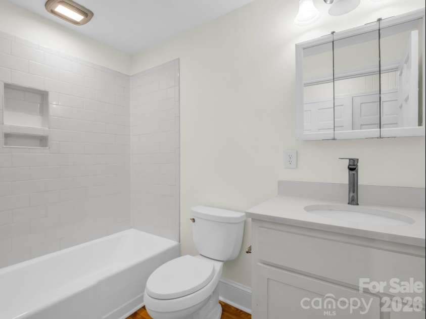 212 Vance Avenue, Black Mountain, NC 28711.  MLS# CAR4367004, YatesRealty ID 16655. Full guest bath in hallway.