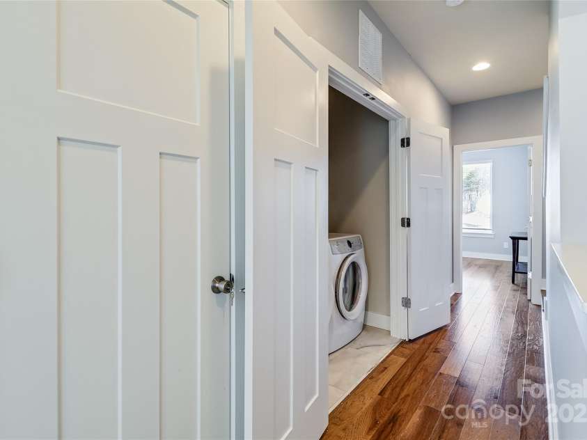 2123 Isom Street, Charlotte, NC 28208.  MLS# CAR4226321, YatesRealty ID 1666. Laundry in hall