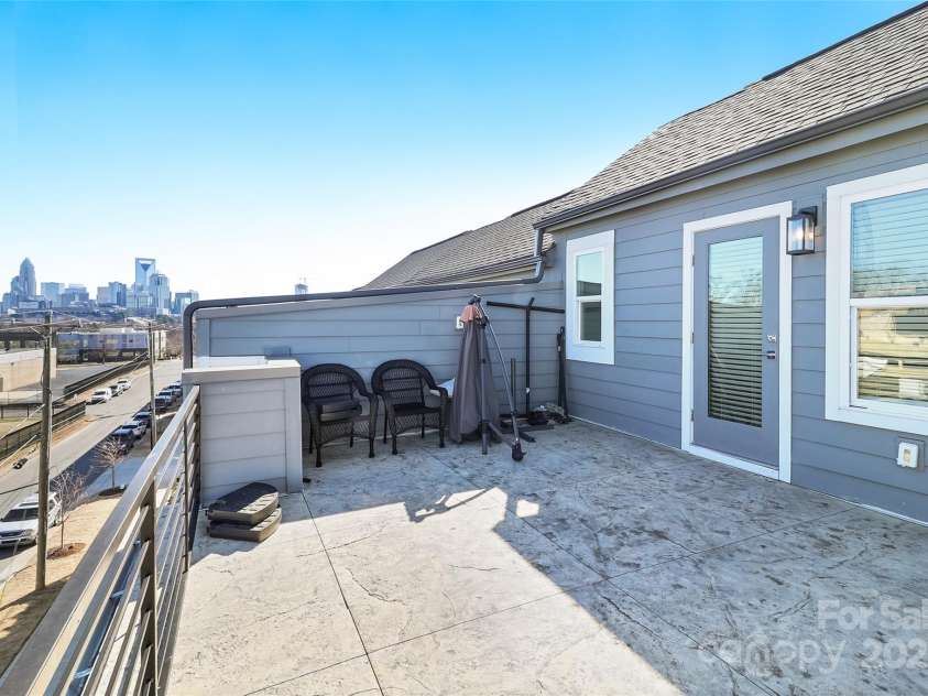 2123 Isom Street, Charlotte, NC 28208.  MLS# CAR4226321, YatesRealty ID 1666. Rooftop terrace