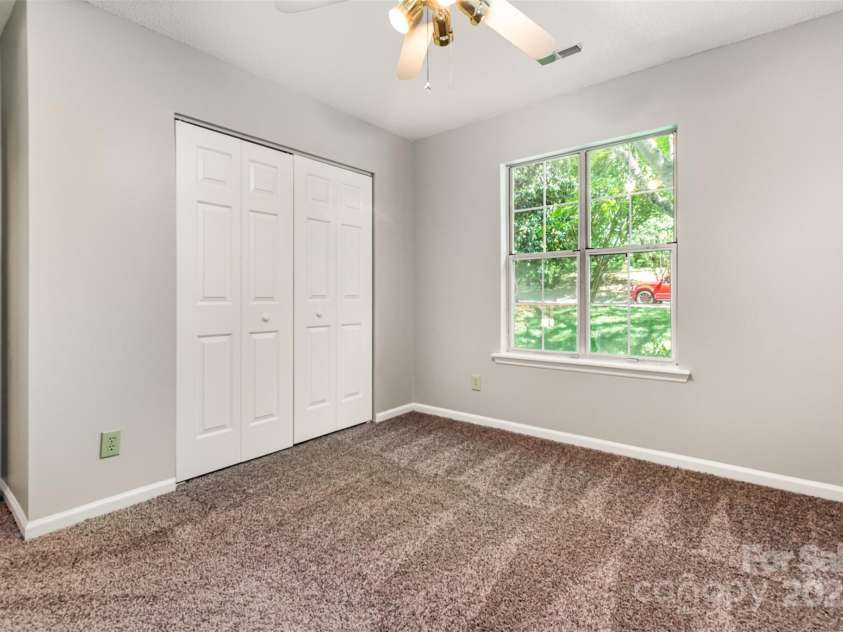 9021 Louvaine Drive, Charlotte, NC 28227.  MLS# CAR4255378, YatesRealty ID 16661. 