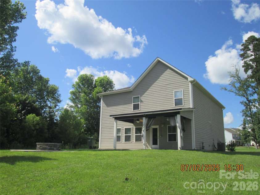 504 Stone River Parkway, Mount Holly, NC 28120.  MLS# CAR4280796, YatesRealty ID 16663. Back of home