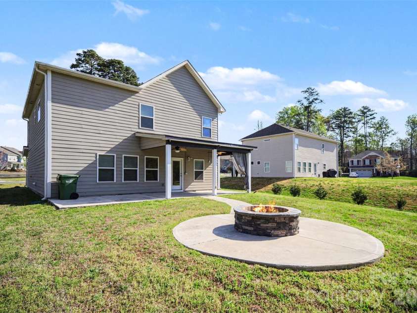 504 Stone River Parkway, Mount Holly, NC 28120.  MLS# CAR4280796, YatesRealty ID 16663. Back yard area is great for entertaining