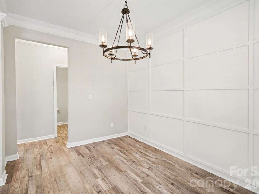 504 Stone River Parkway, Mount Holly, NC 28120.  MLS# CAR4280796, YatesRealty ID 16663. Dining room with accent wall