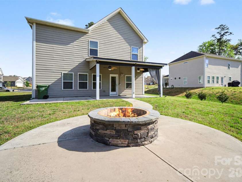 504 Stone River Parkway, Mount Holly, NC 28120.  MLS# CAR4280796, YatesRealty ID 16663. Enjoy your firepit on those cold nights