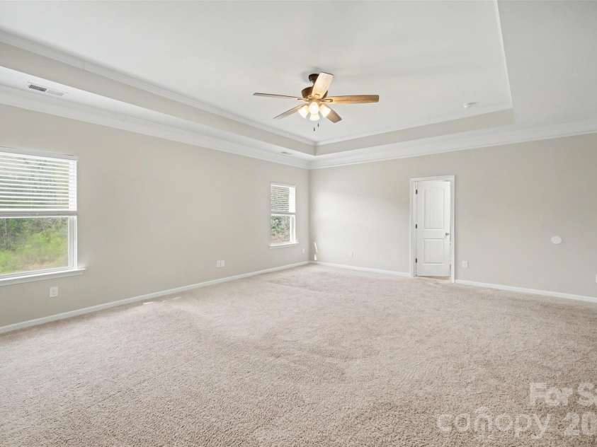 504 Stone River Parkway, Mount Holly, NC 28120.  MLS# CAR4280796, YatesRealty ID 16663. Primary bedroom