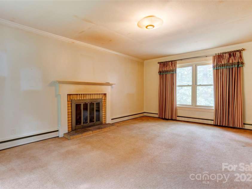 235 John Rainey Road, Salisbury, NC 28147.  MLS# CAR4241333, YatesRealty ID 16665. Living Room with hardwoods under carpet