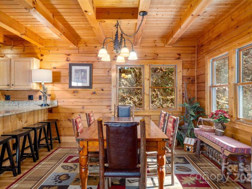 339 Tsalagi Trail, Maggie Valley, NC 28751.  MLS# CAR4263585, YatesRealty ID 16666. Kitchen, breakfast bar and the dining area