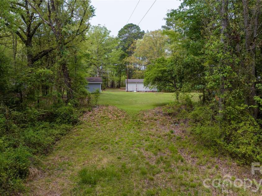 1224 Loop Road, Hookerton, NC 28538.  MLS# CAR4359217, YatesRealty ID 16669. Going to back of land