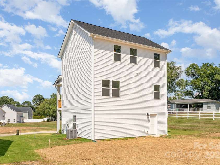 2063 Sadler Woods Lane, Charlotte, NC 28214.  MLS# CAR4275190, YatesRealty ID 1667. Banyan - Back View 1. Representational Photo