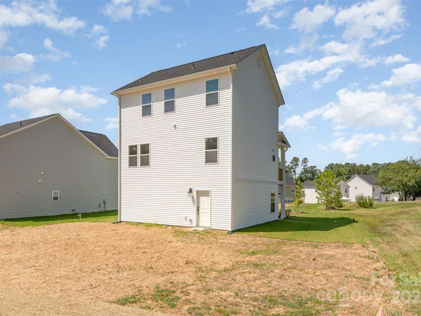 2063 Sadler Woods Lane, Charlotte, NC 28214.  MLS# CAR4275190, YatesRealty ID 1667. Banyan - Back View 2. Representational Photo