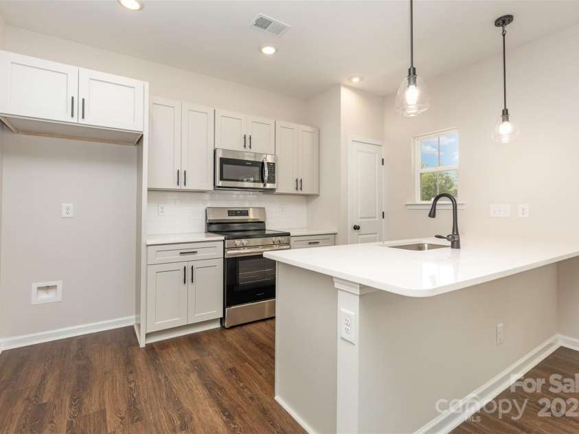 2063 Sadler Woods Lane, Charlotte, NC 28214.  MLS# CAR4275190, YatesRealty ID 1667. Soft-close cabinets. Representational Photo