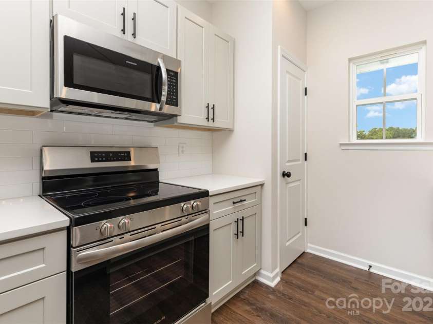 2063 Sadler Woods Lane, Charlotte, NC 28214.  MLS# CAR4275190, YatesRealty ID 1667. Stainless steel appliances. Representational Photo