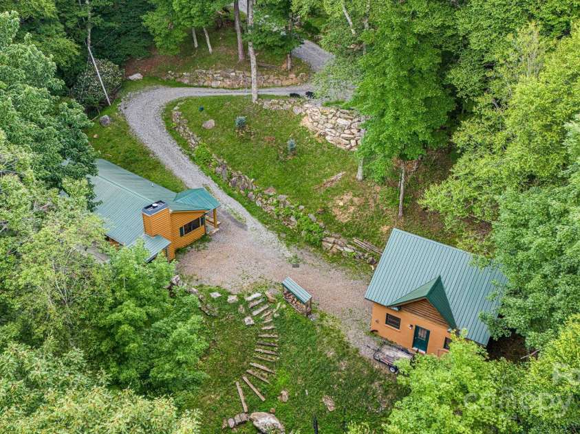 73 Oak Ridge Court, Mars Hill, NC 28754.  MLS# CAR4166537, YatesRealty ID 1667. Sitting at 4000 ft in elevation & surrounded by trees, you can beat the heat of summer.