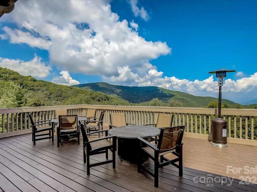 73 Oak Ridge Court, Mars Hill, NC 28754.  MLS# CAR4166537, YatesRealty ID 1667. Wolf Laurel Country Club outdoor dining.