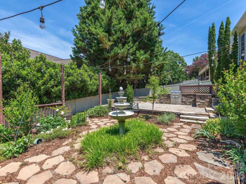 95 Driftstone Circle, Arden, NC 28704.  MLS# CAR4304837, YatesRealty ID 16674. A GARDENER'S DREAM