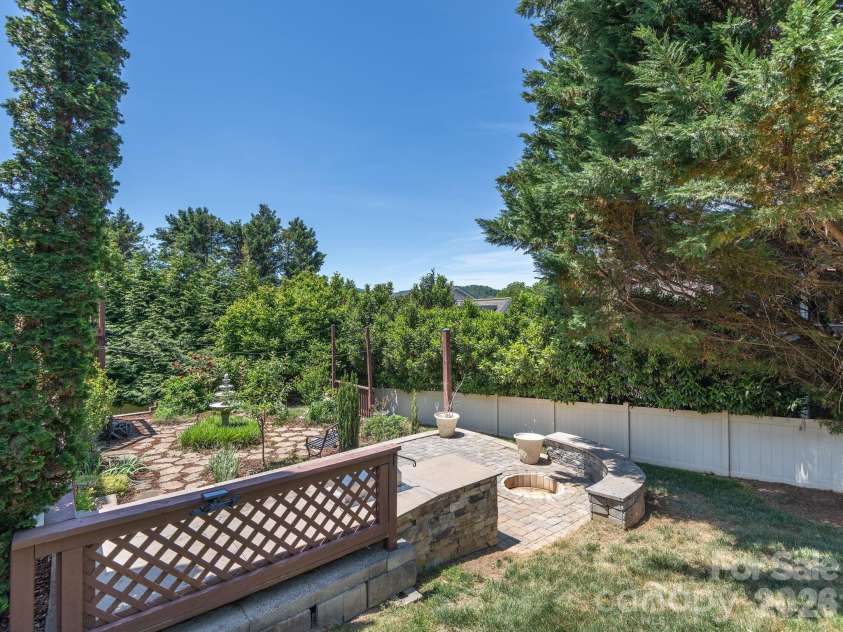 95 Driftstone Circle, Arden, NC 28704.  MLS# CAR4304837, YatesRealty ID 16674. A GARDENER'S DREAM BACKYARD