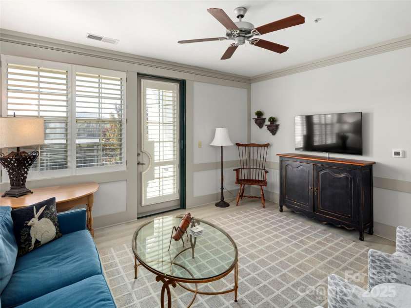 5 Farleigh Street, Asheville, NC 28803.  MLS# CAR4316504, YatesRealty ID 16680. Living Area with door to Balcony.