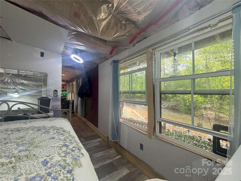 101 Mallard Loop, Waynesville, NC 28785.  MLS# CAR4257285, YatesRealty ID 16684. Also enjoy the river view from you primary bedroom.