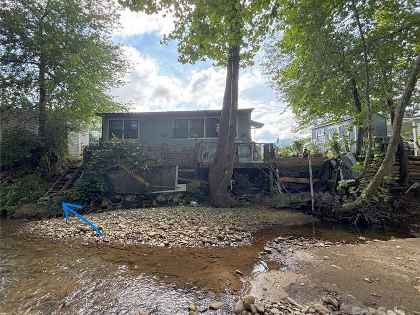101 Mallard Loop, Waynesville, NC 28785.  MLS# CAR4257285, YatesRealty ID 16684. Back view of the house from the creek.