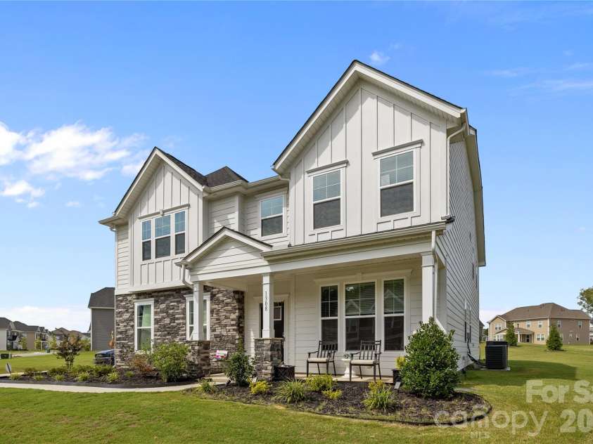 1308 Ashe Meadow Drive, Indian Trail, NC 28079.  MLS# CAR4361531, YatesRealty ID 16685. BOARD & BATTEN ACCENTS ABOVE AD CURB APPEAL TO THE FRONT ELEVATION