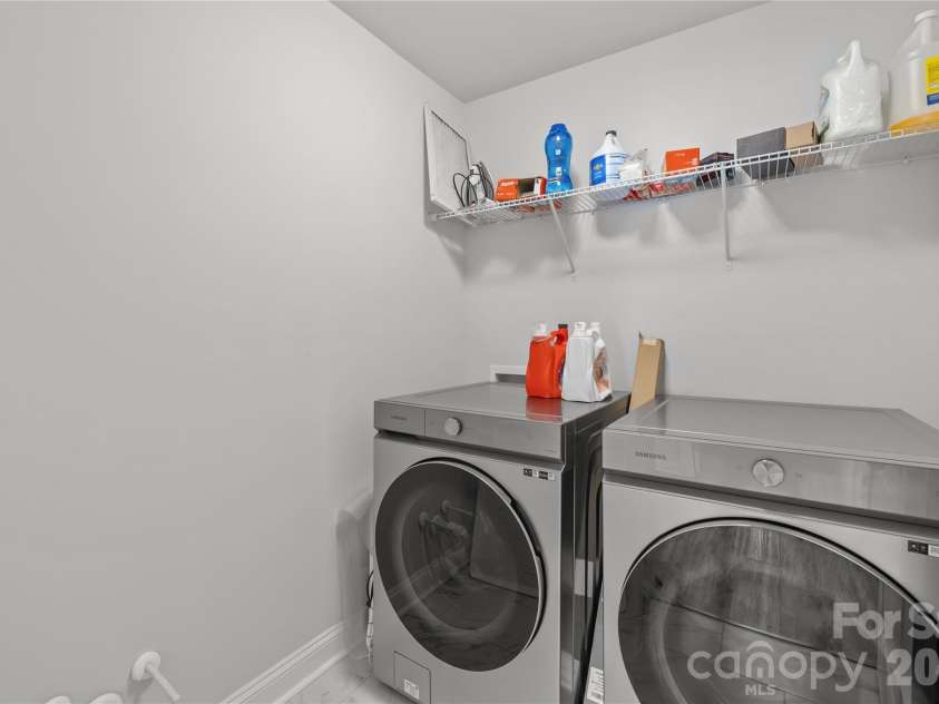 1308 Ashe Meadow Drive, Indian Trail, NC 28079.  MLS# CAR4361531, YatesRealty ID 16685. DEDICATED LAUNDRY ROOM ON UPPER LEVEL HAS PLUMBING FOR A UTILITY SINK