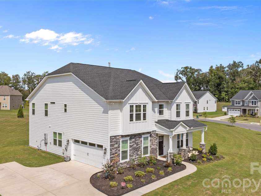 1308 Ashe Meadow Drive, Indian Trail, NC 28079.  MLS# CAR4361531, YatesRealty ID 16685. EXTENDED DRIVEWAY AND SIDE LOAD GARAGE MAKE PARKING A BREEZE