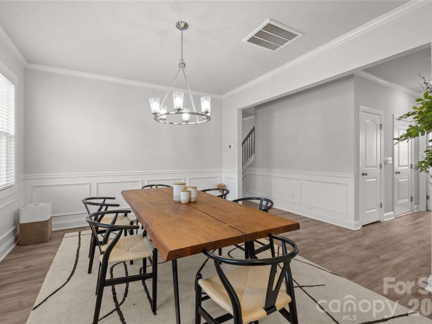 1308 Ashe Meadow Drive, Indian Trail, NC 28079.  MLS# CAR4361531, YatesRealty ID 16685. FORMAL DINING ROOM FEATURES OPEN ENTRY, CROWN MOLDING, CHAIR RAIL & WAINSCOTING 