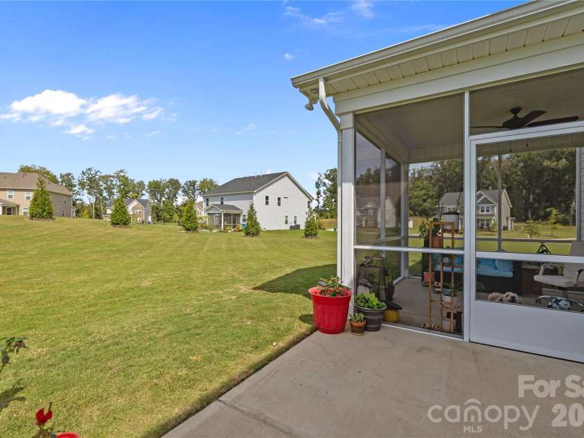 1308 Ashe Meadow Drive, Indian Trail, NC 28079.  MLS# CAR4361531, YatesRealty ID 16685. HUGE BACKYARD AS SEEN FROM THE CONCRETE 12'X12' PATIO