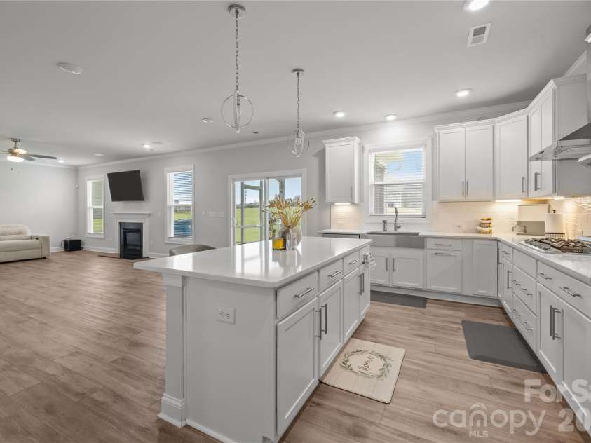 1308 Ashe Meadow Drive, Indian Trail, NC 28079.  MLS# CAR4361531, YatesRealty ID 16685. KITCHEN ISLAND HAS STORAGE AND POWER OUTLETS FOR YOUR CONVENIENCE