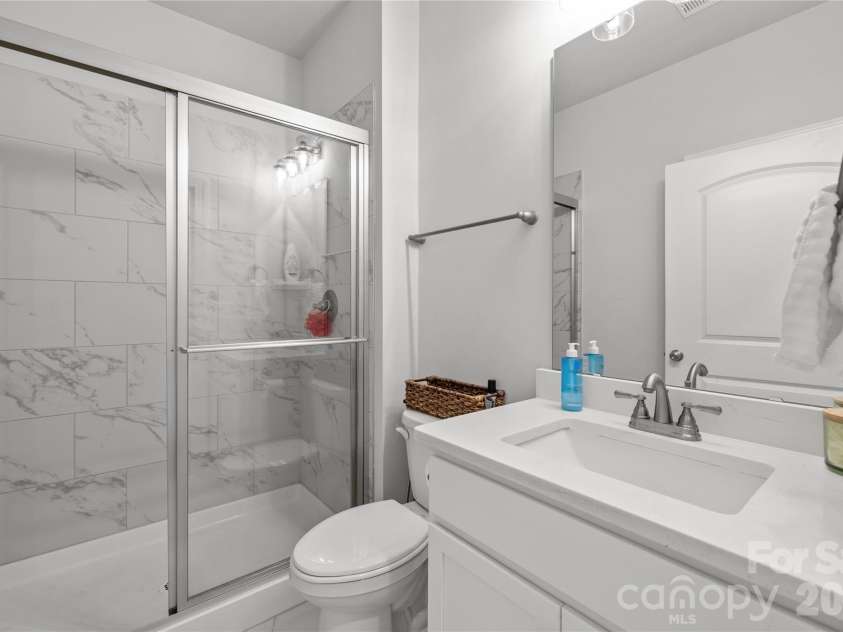 1308 Ashe Meadow Drive, Indian Trail, NC 28079.  MLS# CAR4361531, YatesRealty ID 16685. MAIN LEVEL BEDROOM HAS IT'S VERY OWN FULL BATHROOM