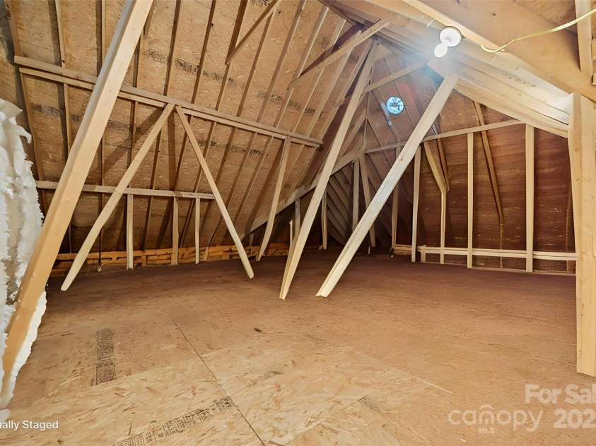 4364 Hager Mountain Lane, Iron Station, NC 28080.  MLS# CAR4172313, YatesRealty ID 16685. Storage Area off Bonus Room where plumbing for a bathroom is in place