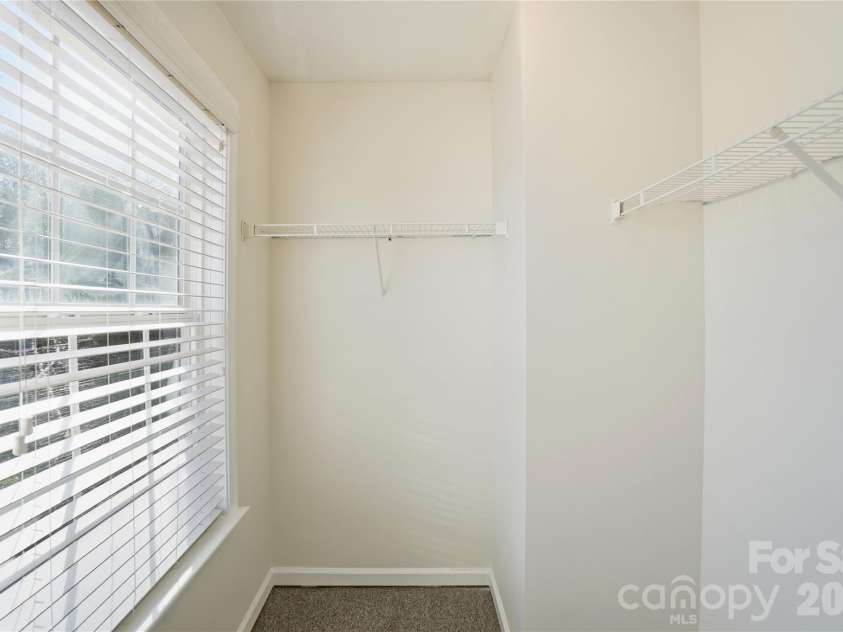 8805 Red Tail Court, Charlotte, NC 28269.  MLS# CAR4382950, YatesRealty ID 1669. Bedroom 3 walk-in closet