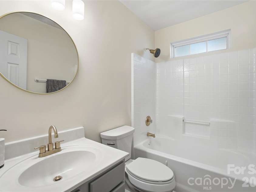 8805 Red Tail Court, Charlotte, NC 28269.  MLS# CAR4382950, YatesRealty ID 1669. Hallway bathroom