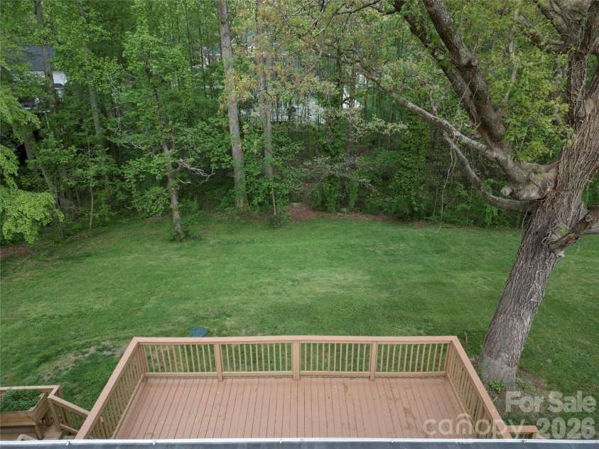 234 Edgewood Drive, Statesville, NC 28625.  MLS# CAR4364089, YatesRealty ID 16694. Large back deck overlooking back yard