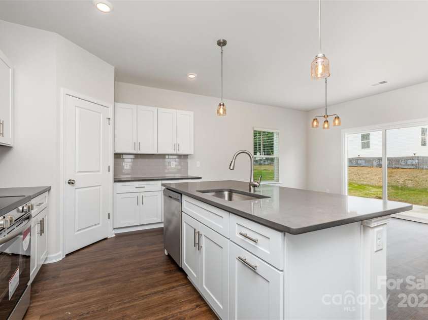 2039 Sadler Woods Lane, Charlotte, NC 28214.  MLS# CAR4265579, YatesRealty ID 1670. Quartz countertops. Representational Photo.