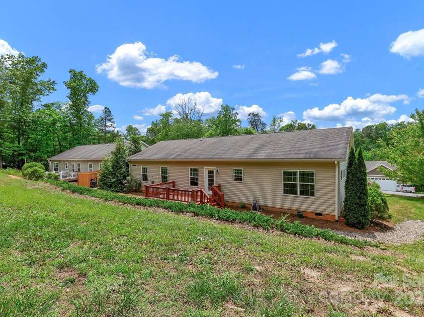 52 Luther Cove Road, Candler, NC 28715.  MLS# CAR4257069, YatesRealty ID 16701. Back of House